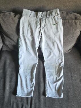 Nike White Youth Baseball Pants with Green Accents